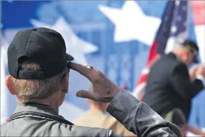  ?? Ryan Painter/The Signal (See additional photos on signalscv.com) ?? Veterans from all over the Santa Clarita Valley joined together for a ceremony at Veterans Historical Plaza in Newhall on Saturday.