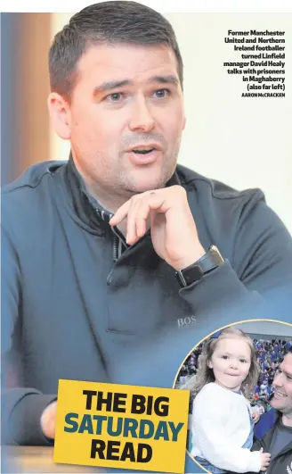  ?? AARON McCRACKEN ?? Former Manchester United and Northern Ireland footballer
turned Linfield manager David Healy talks with prisoners in Maghaberry
(also far left)