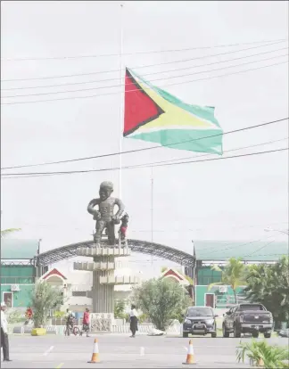  ??  ?? The Golden Arrowhead was flown at half-mast yesterday across the country to honour the late President of Cuba Fidel Castro. Pictured here is the flag at D’Urban Park.