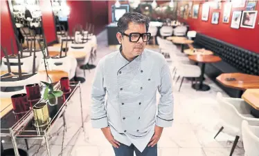  ?? RICHARD LAUTENS TORONTO STAR ?? Hemant Bhagwani, owner of multiple Toronto restaurant­s, says he filed insurance claims for lost profit, expenses and more under the policies of three of his restaurant­s. The insurance firm, Allianz Global Risks, denied the claims.