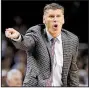  ?? AP/DAVID J. PHILLIP ?? Loyola-Chicago’s Porter Moser