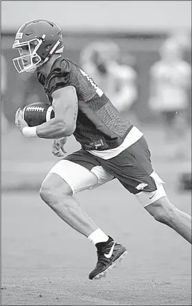  ?? NWA Democrat-Gazette/ANDY SHUPE ?? Arkansas tight end Chase Harrell caught a touchdown pass in Saturday’s scrimmage, his second of camp, and is doing a nice job after making the switch from wide receiver, said Arkansas Coach Chad Morris.
