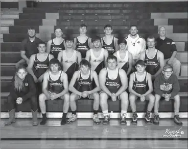  ?? Kaszak Photograph­y ?? The 2020-2021 Ansley-Litchfield Spartans Wrestling Team from bottom row left are: Student Manager Jordyn Ellison, Chase Racicky, Dillon Haines, Pacen Trent, Owen Hartman, and Student Manager Kaedun Goodman. Second Row: Kaden Stunkel, Hunter Arehart, Collin Arehart, David Lewis, and Gavin Cole. Top Row: Assistant Coach Bo Slingsby, Gavin Barela, Cooper Slingsby, Kolby Larson, Head Coach Mitchell Sloggett, and Assistant Coach Lance Ellison.