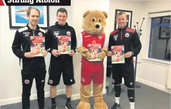  ??  ?? Backing Bino Andy Todd (Community Engagement Manager), Martin Hardie (Stirling Albion assistant manager), Bino the Bear and Kevin Rutkiewicz (Stirling Albion manager) at the launch of the magazine