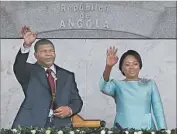 ?? Ampe Rogerio AFP/Getty Images ?? ANGOLAN PRESIDENT Joao Lourenco and his wife, Ana Dias Lourenco, after he was sworn in.