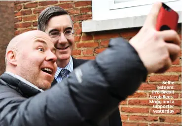  ??  ?? Selfie esteem: Pro-Brexit Jacob ReesMogg and a supporter yesterday