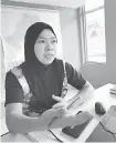  ??  ?? BANTU KERAJAAN: Siti semasa ditemui di pejabatnya semalam.