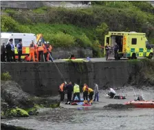  ?? Photo: Wicklow RNLI). ?? Rescue personell on the scene at Wicklow Harbour on Tuesday, May 16 (