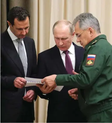  ?? Foto: dpa/Kremlin Pool ?? Planen für die Nachkriegs­ordnung? Assad (li.) und Putin in Sotschi
