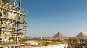  ?? Photograph­s by Jonathan Rashad For The Times ?? THE MUSEUM being built near the Great Pyramids will house all artifacts from King Tutankhame­n’s tomb.