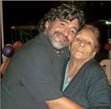  ?? (MARADONA FAMILY/AFP) ?? A file photo given by the Maradona family showing Diego Maradona with his mother Dalma, in Buenos Aires, in what it is supposed to be the last picture of him with her, according to the Maradona family.
