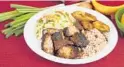  ?? DON PARCHMENT/COURTESY ?? Jerk pork is a favorite at the new Jerk Machine in Fort Lauderdale.