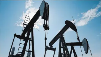  ?? LARRY MACDOUGAL THE CANADIAN PRESS ?? Rising oil prices that encouraged more spending by small and intermedia­te oil and gas companies in Western Canada in the first six months of 2018 are expected to lead drilling budgets to grow even more this fall.
