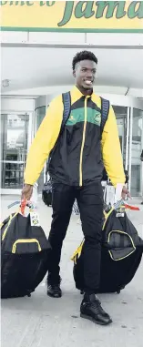  ?? JERMAINE BARNABY/FREELANCE PHOTOGRAPH­ER ?? Shamar Nicholson arriving home last Thursday from Peru, where Jamaica played the home team in a friendly match.