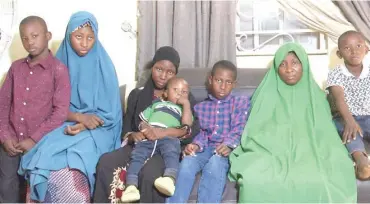  ?? ?? Wife of the late Lt. Col A.H Ali, Hauwa (2nd right) and children
