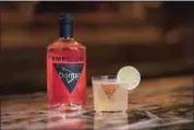  ?? EMPIRICAL ?? The new Empirical x Doritos Nacho Cheese Spirit, with a margarita Empirical’s team made using it.