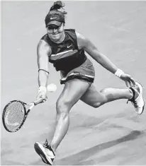  ?? GEOFF BURKE-USA TODAY SPORTS ?? Bianca Andreescu of Canada hits a forehand against Belinda Bencic of Switzerlan­d.