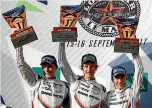  ?? PORSCHE ?? The Porsche team of Kiwis Earl Bamber, left, and Brendon Hartley and German Timo Bernhard celebrate winning the sixth round of the World Endurance Championsh­ip in Texas.
