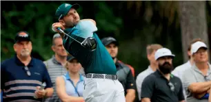  ?? AFP ?? Sergio Garcia of Spain plays his shot from the second tee. —