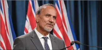  ?? Photo by B.C. government. ?? Labour Minister Harry Bains came under criticism from hotel workers for extending temporaryl­ayoff deadlines, enabling some employers to delay paying severance.