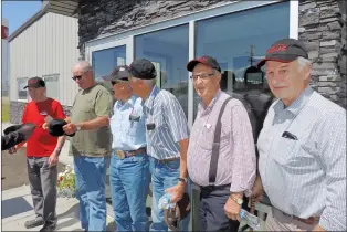  ?? NEWS PHOTO COLLIN GALLANT ?? Six former directors of Rural Electricif­aciton Associatio­ns in the region line up for a photo at the the opening of the new EQUS REA shop south of Medicine Hat on Monday. Pictured from right are Evert Vanderberg, Walter Genesis, Jack Vandervalk, Glen Elliott, Dwayne Gechter and Harold Schnee. Many rural co-op power associatio­ns amalgamate­d in the 1990s to form South Alta REA, which then joined the provincial network of REAs, EQUS, in 2013.