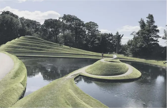  ??  ?? 0 This delightful image of Charles Jencks’ landform sculpture The Cells of Life at Jupiter Artland is contribute­d by Scotsman reader Helen Kirkness