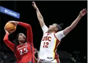  ?? IAN MAULE — THE ASSOCIATED PRESS ?? Arizona's Breya Cunningham shoots over USC's JuJu Watkins during Thursday's Pac-12 Tournament game.