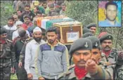  ?? HT PHOTO ?? Body of soldier Ravi Kumar (inset) being taken for cremation in Samba district of Jammu and Kashmir on Wednesday.