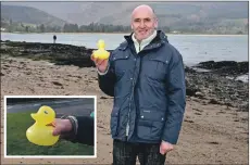  ??  ?? Brian Robertson with Dennis the duck which he found on Brodick beach after Storm Dennis. 01_B08duck01 Inset: Dennis the mystery duck has the number 512 written on its breast and is in remarkably good condition. 01_B08duck02