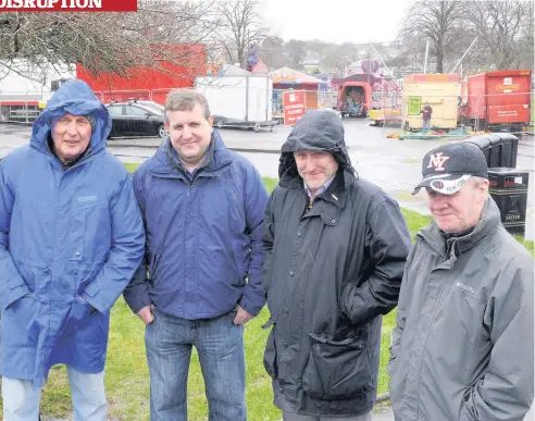  ??  ?? Brassed off Strathaven residents Bruce Martin, Graeme Campbell, Douglas Scott and Allan Martin will be glad to see the back of the funfair