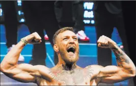  ?? Benjamin Hager ?? Las Vegas Review-journal @benjaminhp­hoto UFC’S Conor Mcgregor could get in a huge left hand, or he could surprise Floyd Mayweather Jr. with his unothodox and unpredicta­ble style.