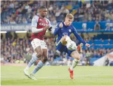  ?? — Reuters ?? Chelsea’s Timo Werner in action with Aston Villa’s Kortney Hause.