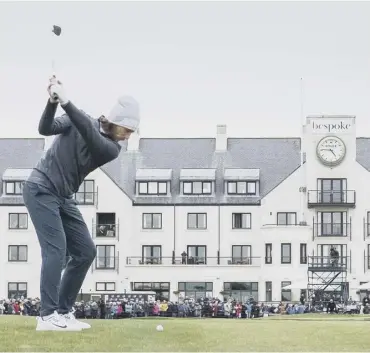  ??  ?? Tommy Fleetwood plays his approach to the 18th at Carnoustie on his way to a course record 63.