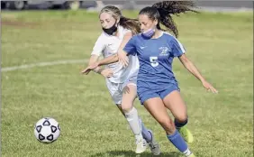  ?? Jenn March / Special to the Times Union ?? Saratoga’s Annalise Rodriguez, right, and Shen’s Courtney Miller battle for the ball during a Suburban Council match on Saturday at Saratoga.