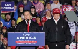  ?? GENE J. PUSKAR — THE ASSOCIATED PRESS ?? Pennsylvan­ia Senate candidate Mehmet Oz, left, accompanie­d by former President Donald Trump, speaks at a campaign rally in Greensburg, Pa., on Friday.