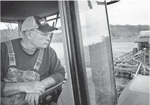  ?? BRIAN POWERS/ USA TODAY NETWORK ?? Despite having half of last year's crop still in bins, Iowa farmer Jim Greif said he is planting because “it is what we do.”