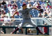  ?? JOHN PETERSON —THE ASSOCIATED PRESS ?? Texas A&M starting pitcher Nathan Dettmer throws a pitch against Notre Dame in the first inning during an NCAA World Series game Tuesday in Omaha, Neb.