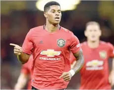  ??  ?? Manchester United striker, Marcus Rashford celebrates after scoring one of his goals against Chelsea yesterday