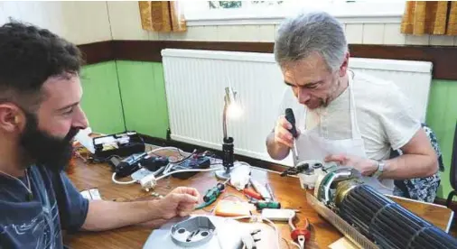  ??  ?? ■ Repair Cafés are opened once a month during a part of the day and visitors are helped by volunteers who repair the broken items while teaching the visitors how to repair them. Repairs are done free of charge. Photo courtesy Repair Café Internatio­nal...