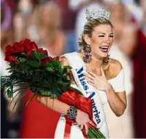  ?? — AP ?? Dragged in the mud: Miss New York Mallory Hytes Hagan reacting as she was crowned Miss America in Las Vegas in 2013. Hagan’s sexual habits were mocked in the email scandal.