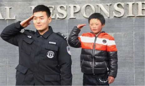  ?? VISUAL CHINA GROUP VIA GETTY IMAGES ?? A Communist Party website invited 8-year-old Fuman Wang, known as “Frost Boy,” to Beijing for a weekend and celebrated him as a patriotic hero.