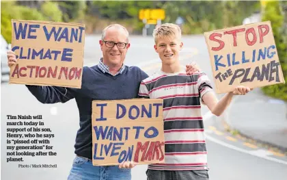  ?? Photo / Mark Mitchell ?? Tim Naish will march today in support of his son, Henry, who he says is “pissed off with my generation” for not looking after the planet.