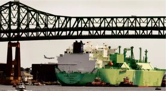  ?? STAN GROSSFELD/GLOBE STAFF/FILE ?? An LNG tanker passed under the Tobin Bridge in 2010. The Tobin, which connects Boston and Chelsea over the Mystic River, along with the Braga Bridge, connecting Somerset and Fall River over the Taunton River, are the two state bridges with a similar structure to the one in Baltimore that collapsed and also cross over maritime traffic.