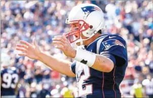  ?? JIM ROGASH/GETTY IMAGES/AFP ?? Tom Brady of the New England Patriots reacts during the third quarter of their game against the Houston Texans at Gillette Stadium on Sunday.