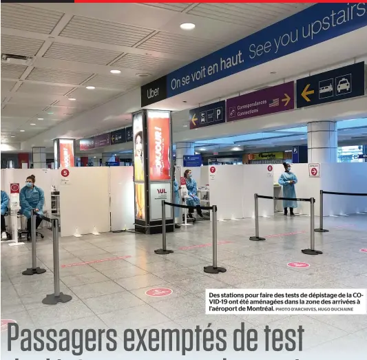  ?? PHOTO D’ARCHIVES, HUGO DUCHAINE ?? Des stations pour faire des tests de dépistage de la COVID-19 ont été aménagées dans la zone des arrivées à l’aéroport de Montréal.