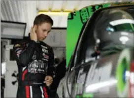  ?? MATT SLOCUM — THE ASSOCIATED PRESS ?? John Hunter Nemechek prepares Truck race Friday in Long Pond. to practice for Saturday’s NASCAR