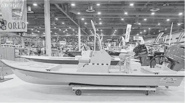  ?? James Nielsen / Houston Chronicle ?? The Houston Boat, Sport & Travel Super Show features a variety of boats and outdoor gear designed to keep the anglers in the family high and dry.