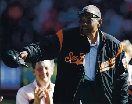  ?? NHAT V. MEYER — STAFF PHOTOGRAPH­ER ?? San Francisco Giants icon Willie Mays acknowledg­es a cheering crowd during a postgame ceremony in 2019. He remains vital today.