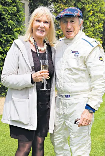  ??  ?? The golden couple: Sir Jackie and Lady Stewart with their sons Paul and Mark at the Italian Grand Prix in 1969, left; at the Goodwood Festival of Speed in June 2016