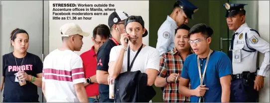  ??  ?? STRESSED: Workers outside the Accenture offices in Manila, where Facebook moderators earn as little as £1.36 an hour